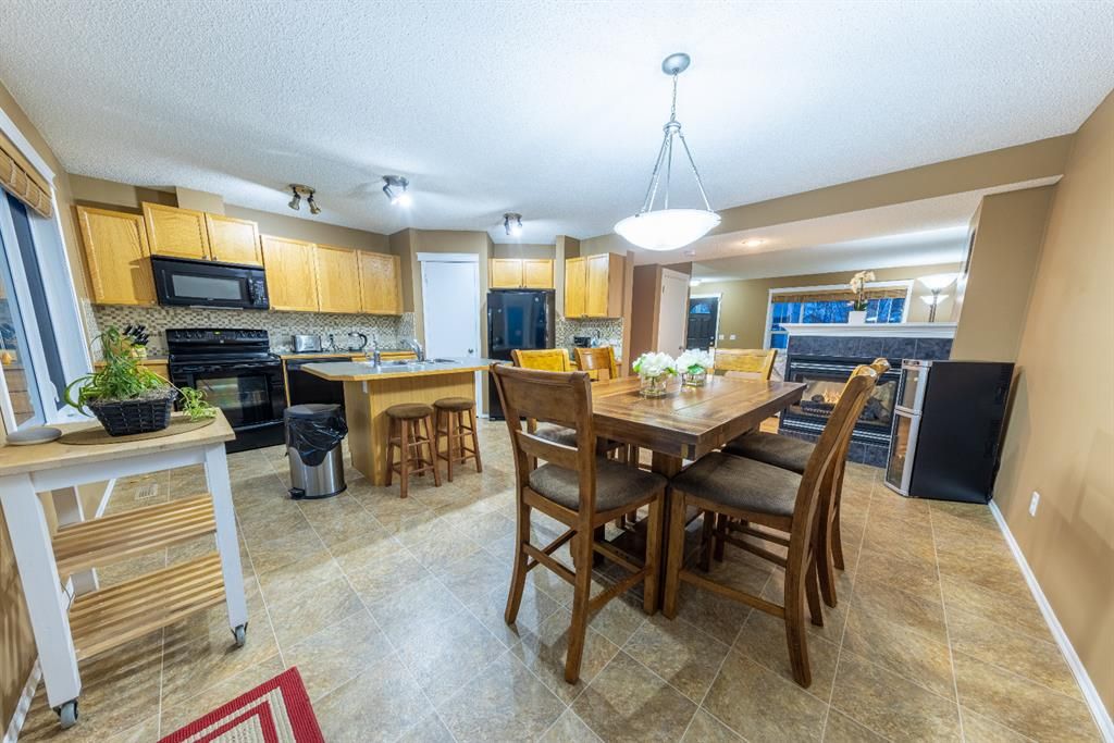 Photo 2: Photos: 83 Tuscany Springs Way NW in Calgary: Tuscany Detached for sale : MLS®# A1195730