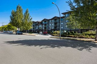 Photo 2: 403 2038 SANDALWOOD Crescent in Abbotsford: Central Abbotsford Condo for sale in "The Element" : MLS®# R2721293