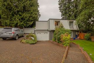 Photo 1: 405 DARTMOOR Drive in Coquitlam: Coquitlam East House for sale : MLS®# R2061799