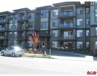 Photo 1: 403 33338 MAYFAIR Avenue in Abbotsford: Central Abbotsford Condo for sale in "The Sterling" : MLS®# F2909510