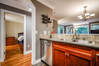 Photo 5: 102 735 W 15TH Avenue in Vancouver: Fairview VW Condo for sale in "Windgate Willow" (Vancouver West)  : MLS®# R2466014