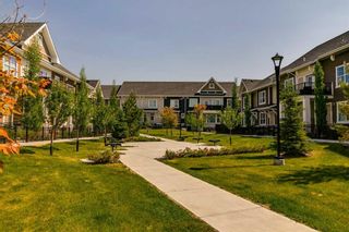 Photo 2: 161 Cranbrook Walk SE in Calgary: Cranston Row/Townhouse for sale : MLS®# A2055769