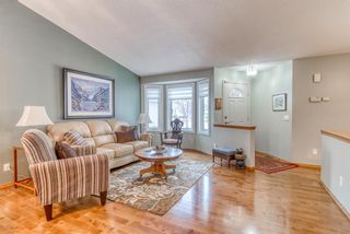 Photo 2: 210 Arbour Cliff Close NW in Calgary: Arbour Lake Semi Detached for sale : MLS®# A1086025
