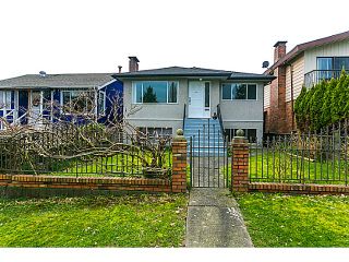 Photo 1: 3128 E 1ST Avenue in Vancouver: Renfrew VE House for sale in "RENFREW" (Vancouver East)  : MLS®# V1108136