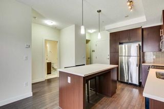 Photo 4: 113 15233 1 Street SE in Calgary: Midnapore Apartment for sale : MLS®# A2120596