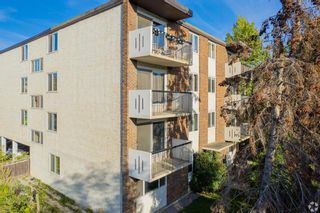 Photo 2: 0 623 9A Street NW in Calgary: Sunnyside Apartment for sale : MLS®# A2101712