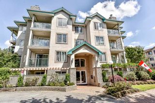 Photo 1: 404 20453 53 Avenue in Langley: Langley City Condo for sale : MLS®# R2186113