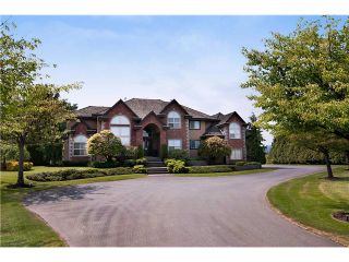 Photo 1: 14567 CHARLIER Road in Pitt Meadows: North Meadows House for sale : MLS®# V1007695