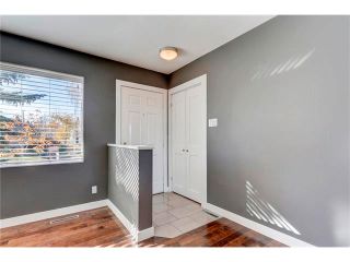 Photo 10: 5612 LADBROOKE Drive SW in Calgary: Lakeview House for sale : MLS®# C4036600