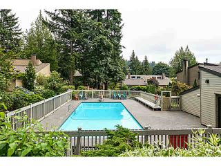 Photo 1: 1037 HERITAGE Boulevard in North Vancouver: Seymour NV Townhouse for sale in "HERITAGE IN THE WOODS" : MLS®# V1090687