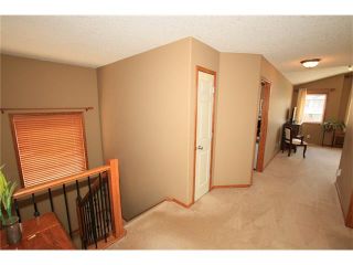 Photo 15: 18 WEST POINTE Manor: Cochrane House for sale : MLS®# C4072318