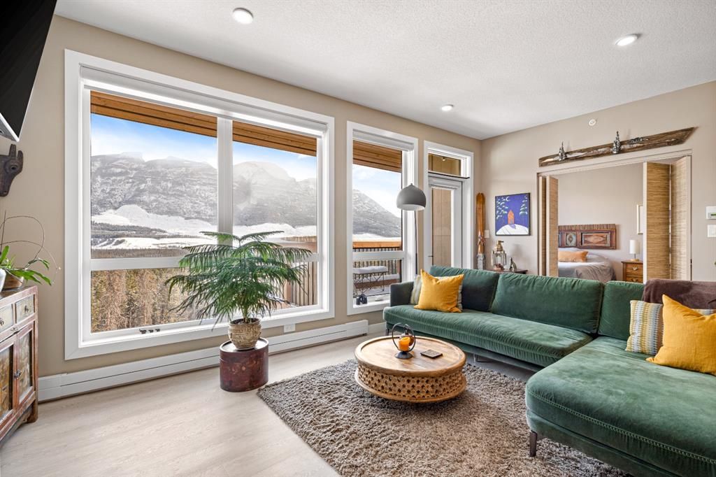 Main Photo: 310 106 Stewart Creek Rise: Canmore Apartment for sale : MLS®# A1192429