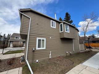 Photo 3: 702 829 Coach Bluff Crescent SW in Calgary: Coach Hill Row/Townhouse for sale : MLS®# A2122532