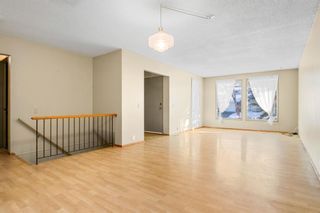 Photo 7: 603 Woodpark Boulevard SW in Calgary: Woodlands Detached for sale : MLS®# A2012452