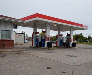 Photo 1: ESSO gas station for sale East Edmonton Alberta: Business with Property for sale