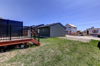 Photo 26: 887 Carrington Boulevard NW in Calgary: Carrington Semi Detached (Half Duplex) for sale : MLS®# A2049176