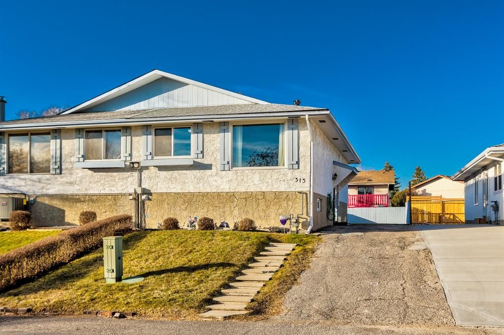 Main Photo: 313 42 Street SE in Calgary: Forest Heights Semi Detached for sale : MLS®# A1161495