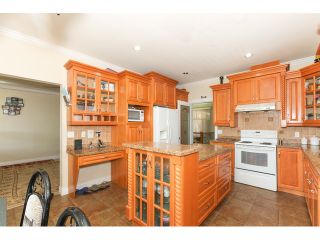 Photo 11: 12550 89A Avenue in Surrey: Queen Mary Park Surrey House for sale : MLS®# F1438329