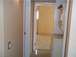 Photo 10: LINDA VISTA Condo for sale : 2 bedrooms : 7167 Camino Degrazia #108 in San Diego