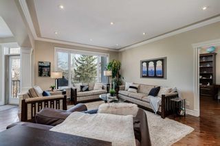 Photo 4: 16 Coulee Park SW in Calgary: Cougar Ridge Detached for sale : MLS®# A2125322