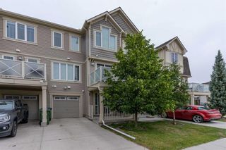 Photo 1: 328 Windstone Gardens SW: Airdrie Row/Townhouse for sale : MLS®# A2057883