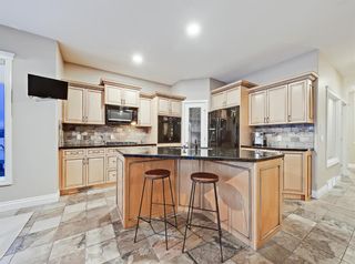 Photo 3: 30 Springborough Crescent SW in Calgary: Springbank Hill Detached for sale : MLS®# A1070980