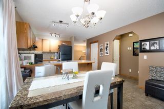 Photo 10: 584 Stonegate Way NW: Airdrie Semi Detached for sale : MLS®# A1245597