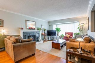 Photo 2: 8736 TULSY Crescent in Surrey: Queen Mary Park Surrey House for sale : MLS®# R2192315