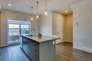 Photo 11: 142 Shawnee Common SW in Calgary: Shawnee Slopes Row/Townhouse for sale : MLS®# A2103685