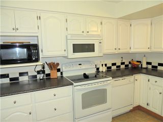 Photo 1: 508 LEHMAN PL in Port Moody: North Shore Pt Moody Townhouse for sale in "EAGLE POINT" : MLS®# V1023491