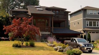 Photo 1: 1028 PIA Road in Squamish: Garibaldi Highlands House for sale in "Garibaldi Highlands" : MLS®# R2429962