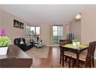 Photo 5: 309 3455 ASCOT Place in Vancouver: Collingwood VE Condo for sale in "QUEEN'S COURT" (Vancouver East)  : MLS®# V1105567