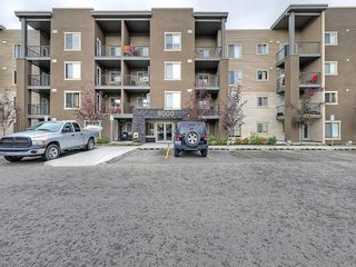 Photo 1: 8407 403 Mackenzie Way SW: Airdrie Apartment for sale : MLS®# A1120611