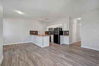 Photo 2: 136 Everridge Gardens SW in Calgary: Evergreen Row/Townhouse for sale : MLS®# A1259244
