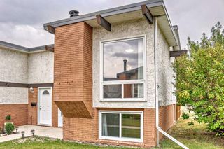 Photo 3: 304 Pinemont Gate NE in Calgary: Pineridge Semi Detached (Half Duplex) for sale : MLS®# A2074875