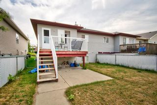 Photo 34: 584 Stonegate Way NW: Airdrie Semi Detached for sale : MLS®# A1245597