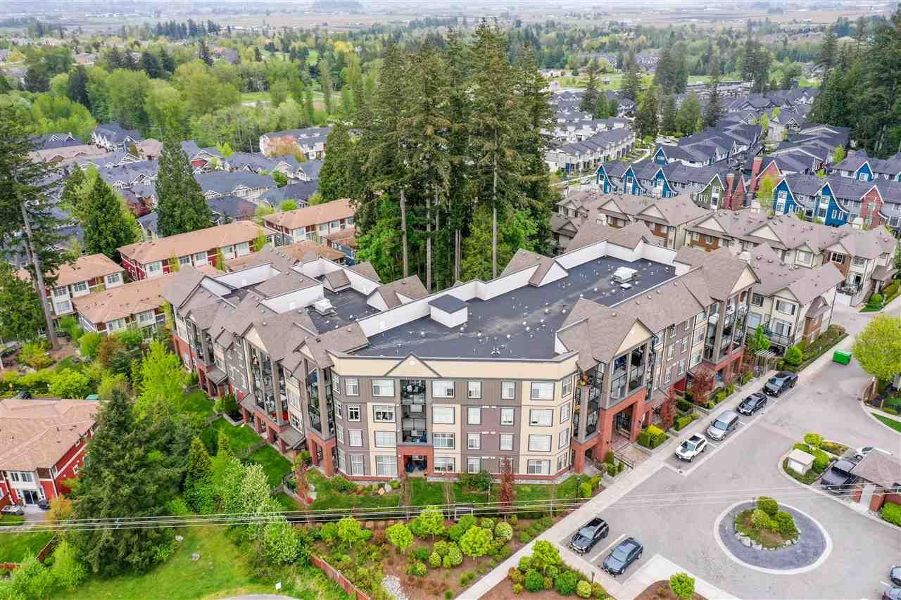 Main Photo: 409 2855 156 Street in Surrey: Grandview Surrey Condo for sale in "The Heights" (South Surrey White Rock)  : MLS®# R2575339