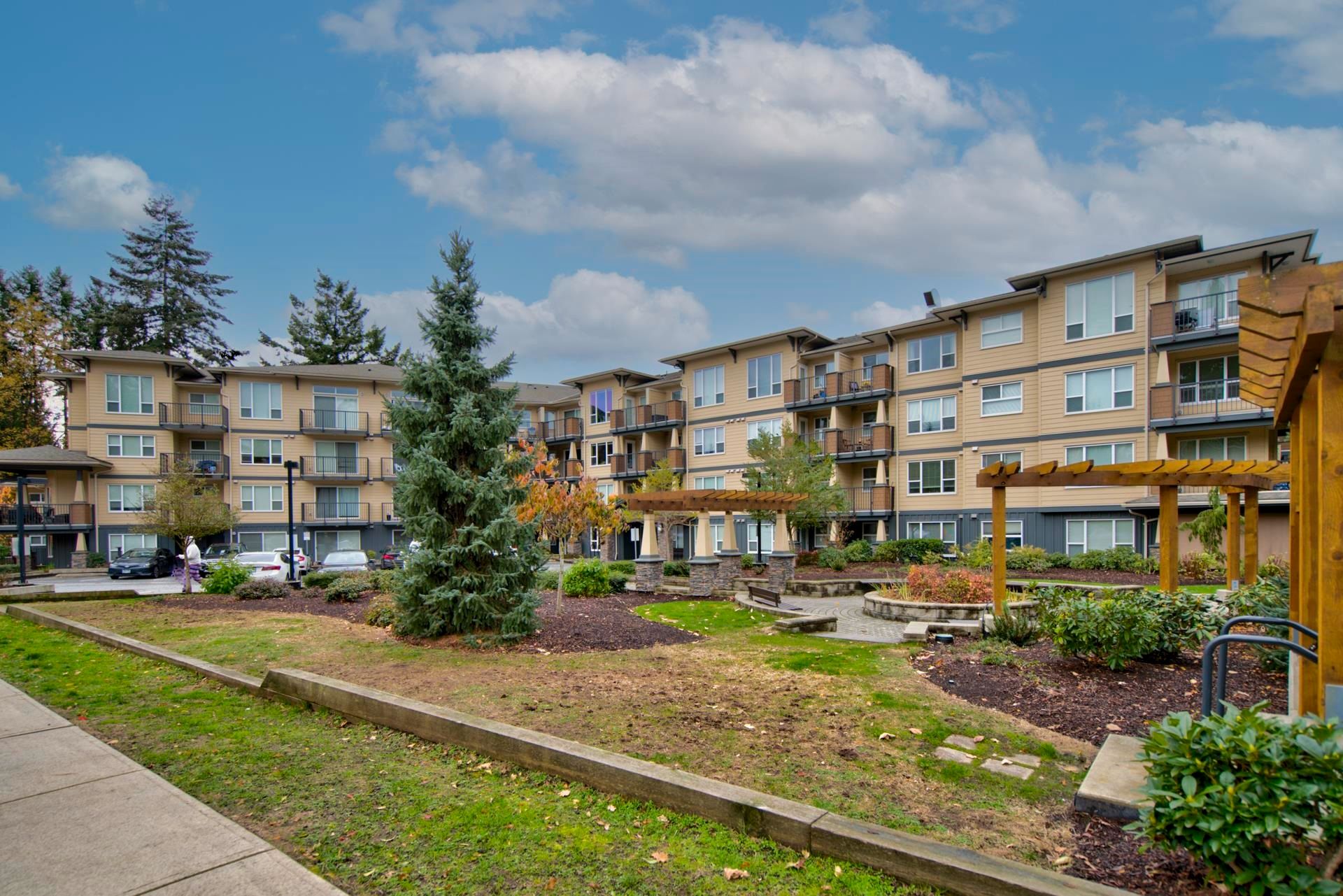 Main Photo: 404 2565 CAMPBELL Avenue in Abbotsford: Central Abbotsford Condo for sale in "Abacus" : MLS®# R2631443