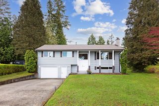Photo 1: 4561 UPLANDS Drive in Langley: Langley City House for sale : MLS®# R2681144