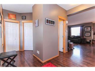 Photo 4: 381 ELGIN Way SE in Calgary: McKenzie Towne House for sale : MLS®# C4036653