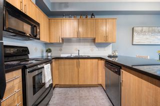 Photo 2: 106 3260 ST JOHNS Street in Port Moody: Port Moody Centre Condo for sale : MLS®# R2758253