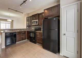 Photo 10: 1406 125 Panatella Way NW in Calgary: Panorama Hills Row/Townhouse for sale : MLS®# A2021769