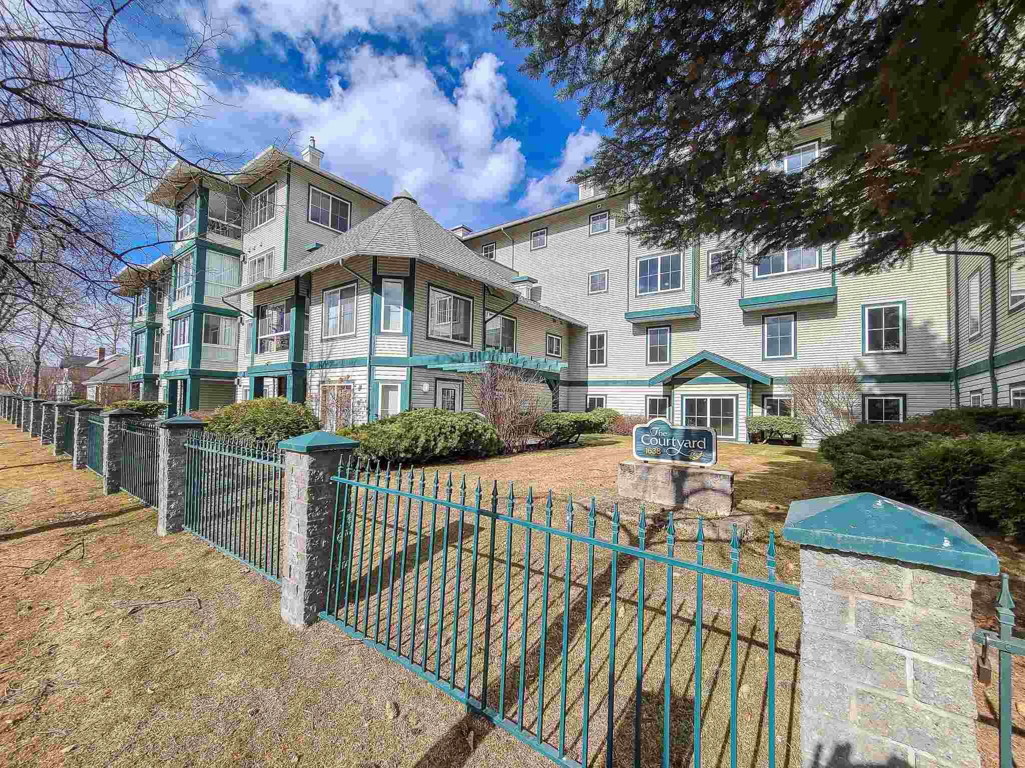 Main Photo: 107 1638 6TH Avenue in Prince George: Downtown PG Condo for sale in "COURT YARD ON 6TH" (PG City Central (Zone 72))  : MLS®# R2597416