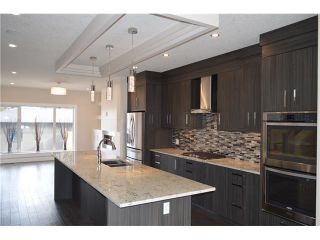 Photo 2: 1126 40 ST SW in Calgary: Rosscarrock House for sale : MLS®# C4051284