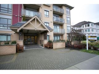 Photo 2: 108 5811 177B Street in Surrey: Cloverdale BC Condo for sale in "LATIS" (Cloverdale)  : MLS®# R2023487