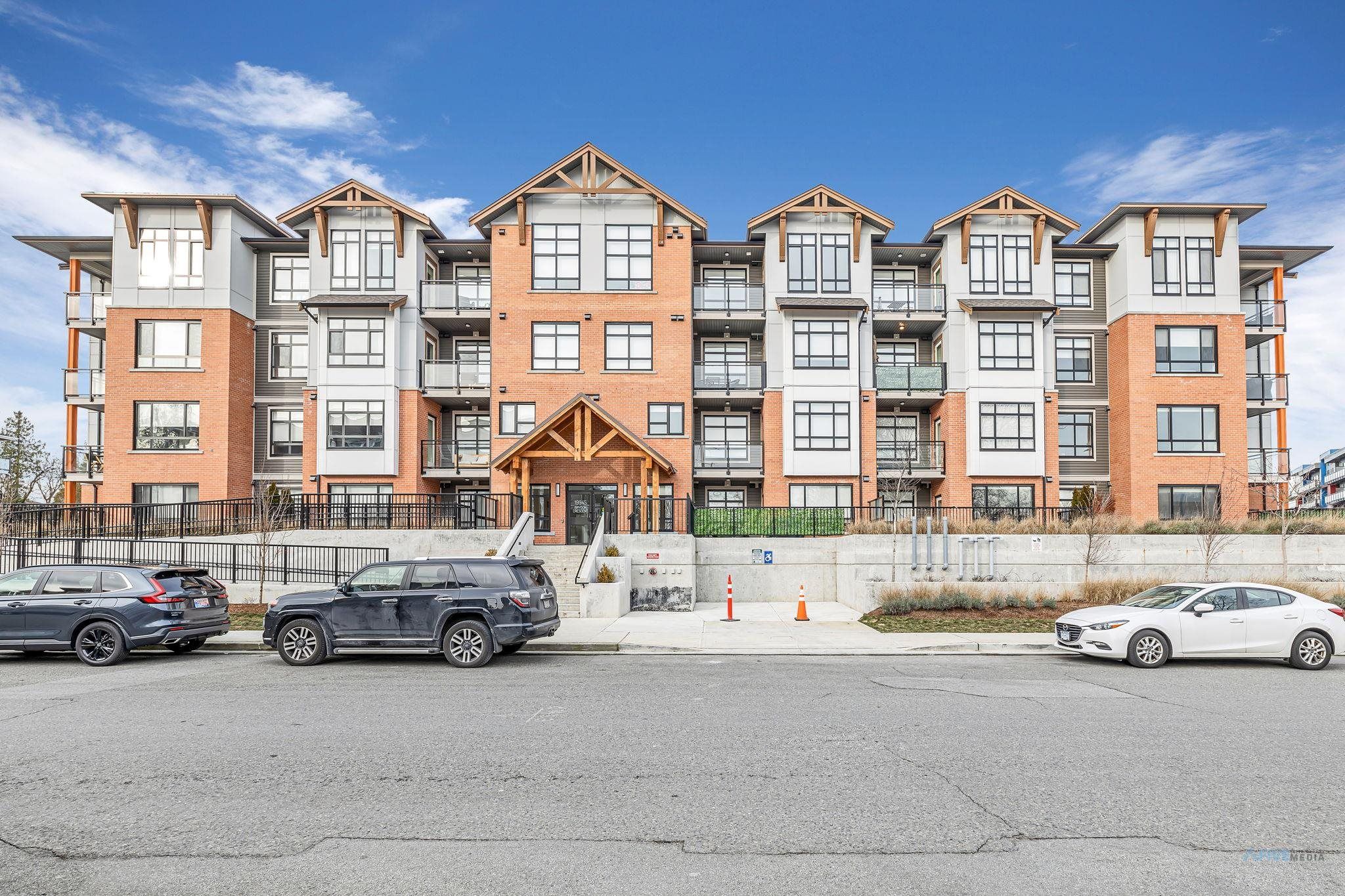Main Photo: 216 19945 BRYDON Crescent in Langley: Langley City Condo for sale in "ATRIUM" : MLS®# R2846420