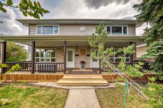 Main Photo: 1031 39 Avenue NW in Calgary: Cambrian Heights Full Duplex for sale : MLS®# A2135636