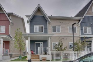 Main Photo: 614 32 Red Embers Parade NE in Calgary: Redstone Row/Townhouse for sale : MLS®# A2139019