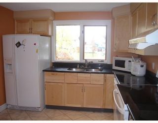 Photo 5: 1055 ABBEYDALE Drive NE in CALGARY: Abbeydale Residential Detached Single Family for sale (Calgary)  : MLS®# C3312404