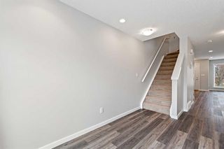 Photo 10: 205 2400 Ravenswood View SE: Airdrie Row/Townhouse for sale : MLS®# A2126467